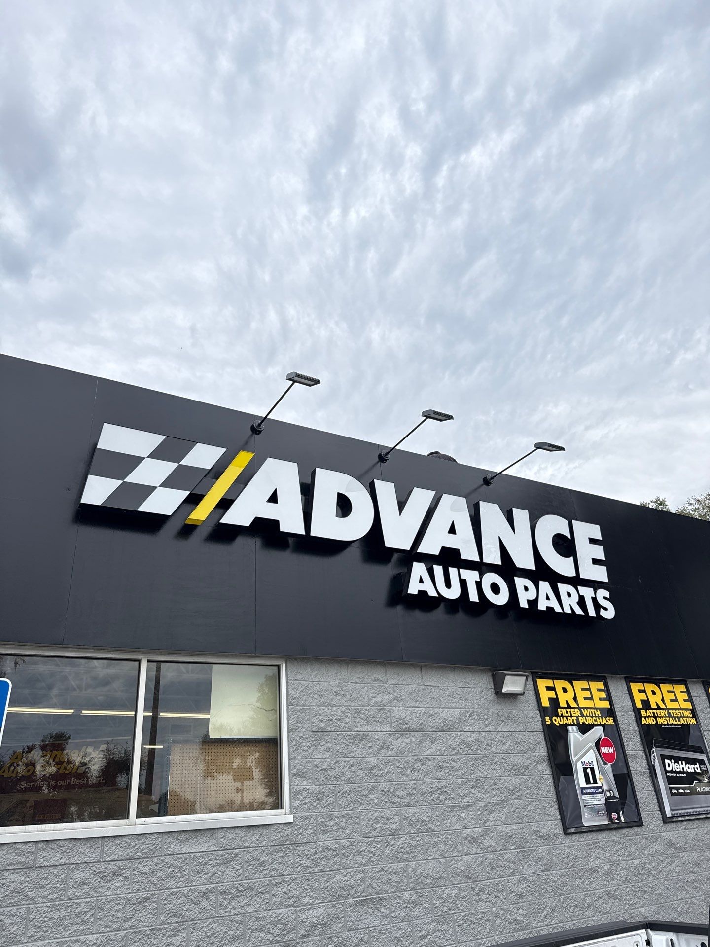 Advance Auto Parts sign with lights installed