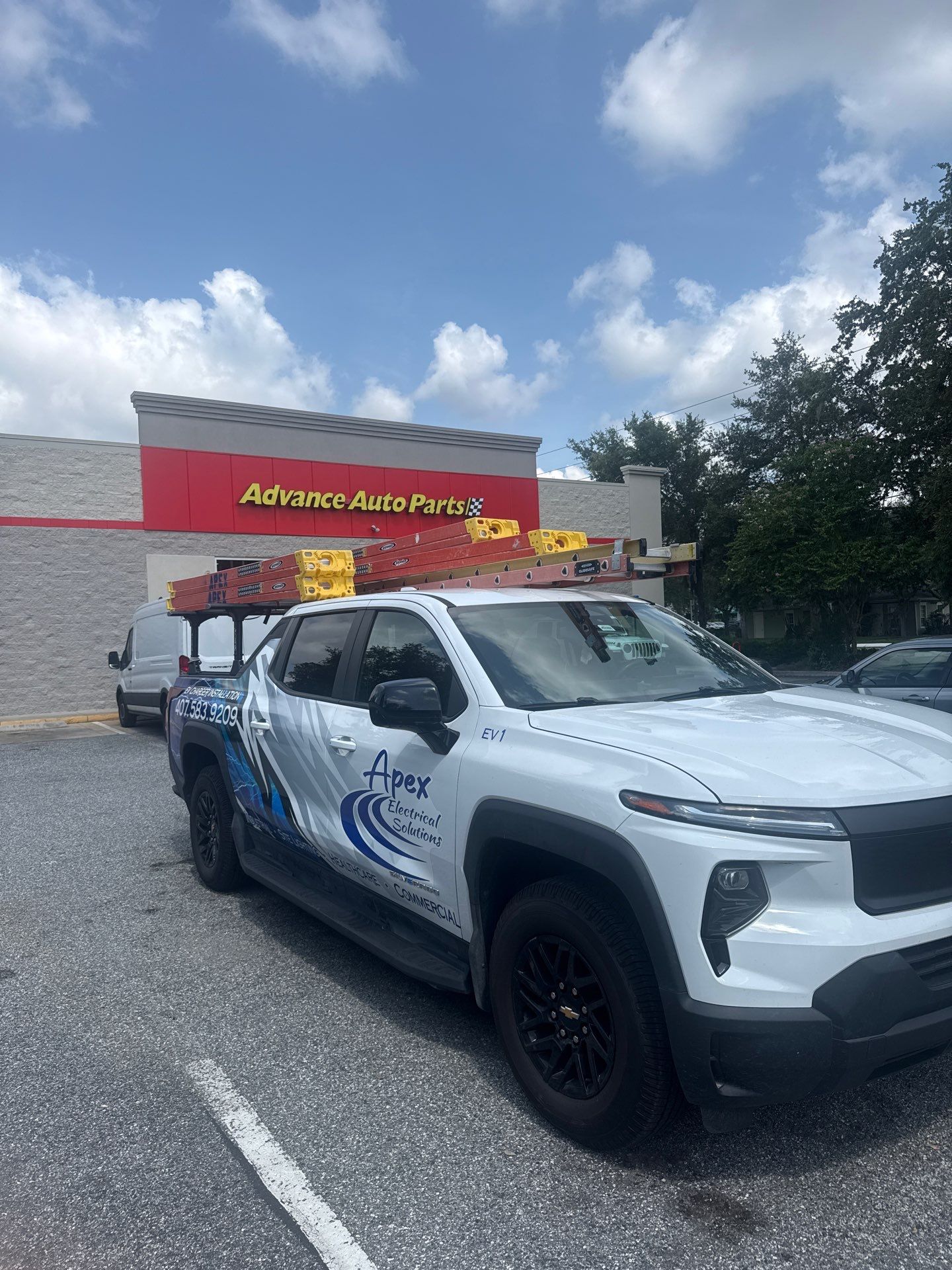Apex Electrical Solutions vehicle parked at Advance Auto Parts